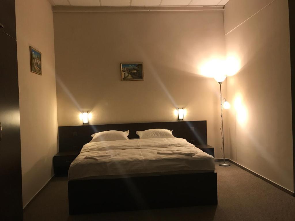 Postel nebo postele na pokoji v ubytování Casa IDA 1896