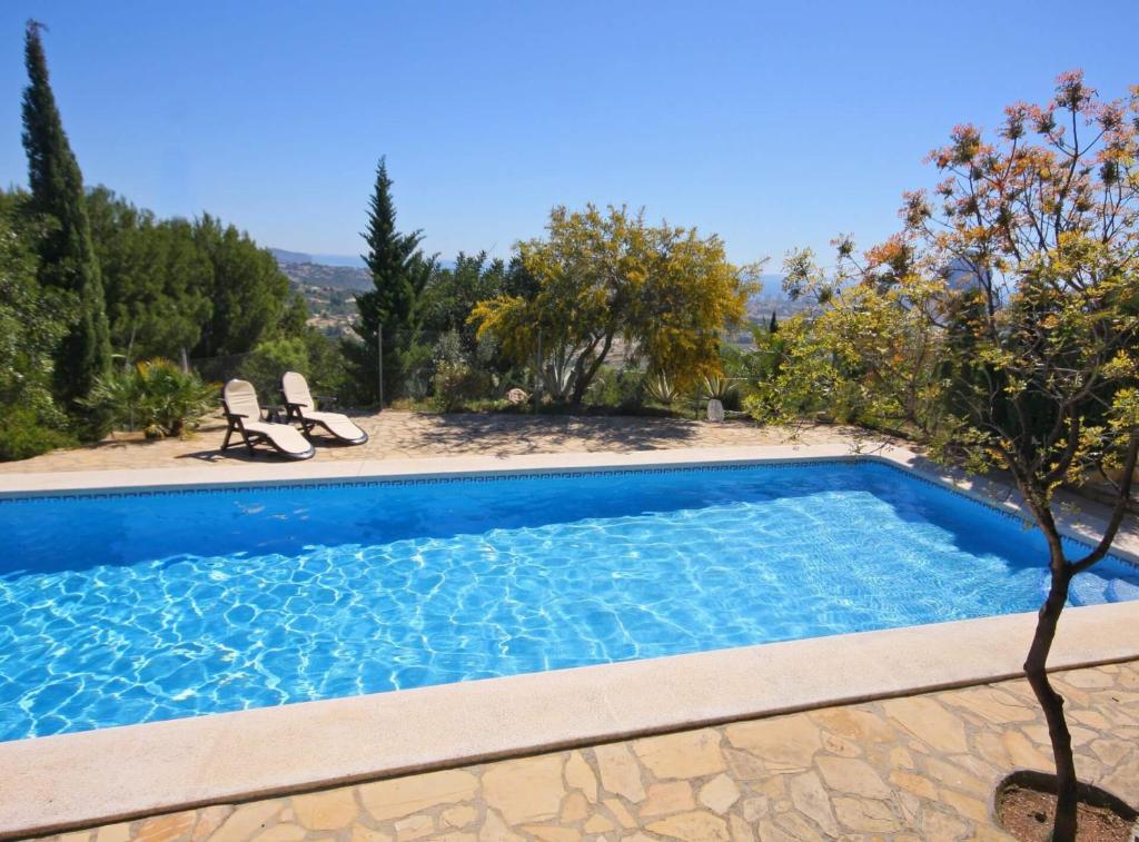 an image of a swimming pool in a villa at Villa Stefan - Plusholidays in Calpe