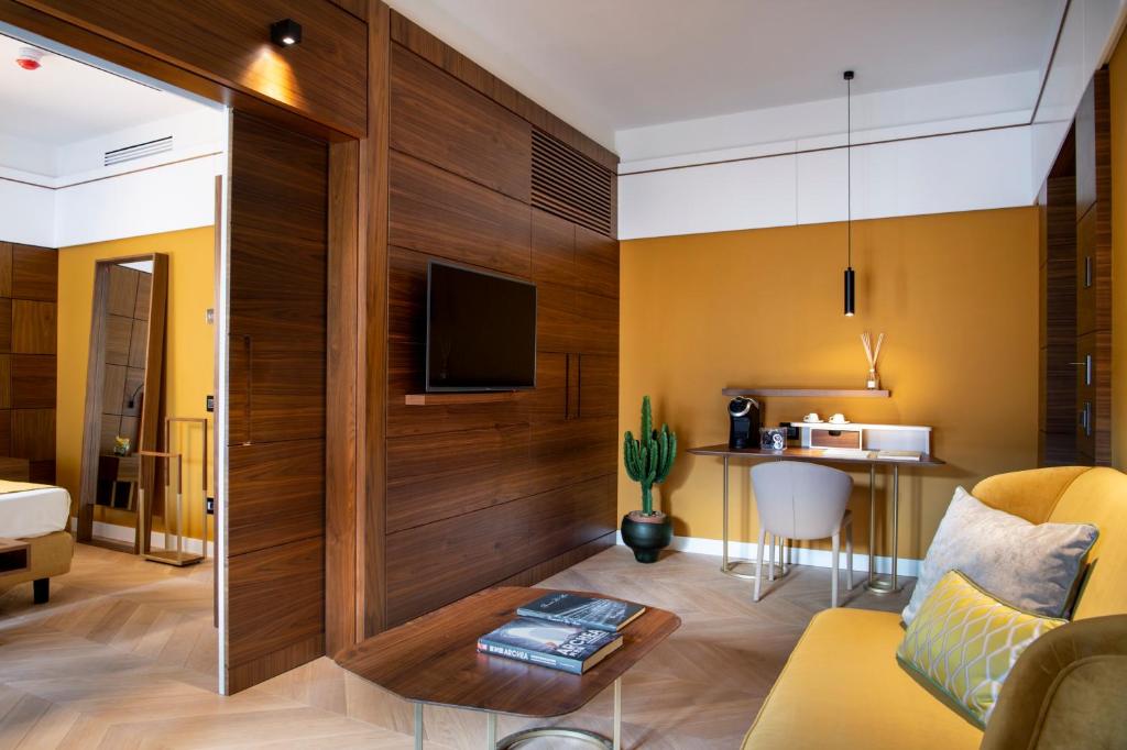 TV a/nebo společenská místnost v ubytování Hotel degli Orafi