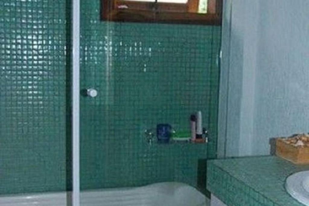  Casa com 4 suítes a 200 metros da Rua das Pedras