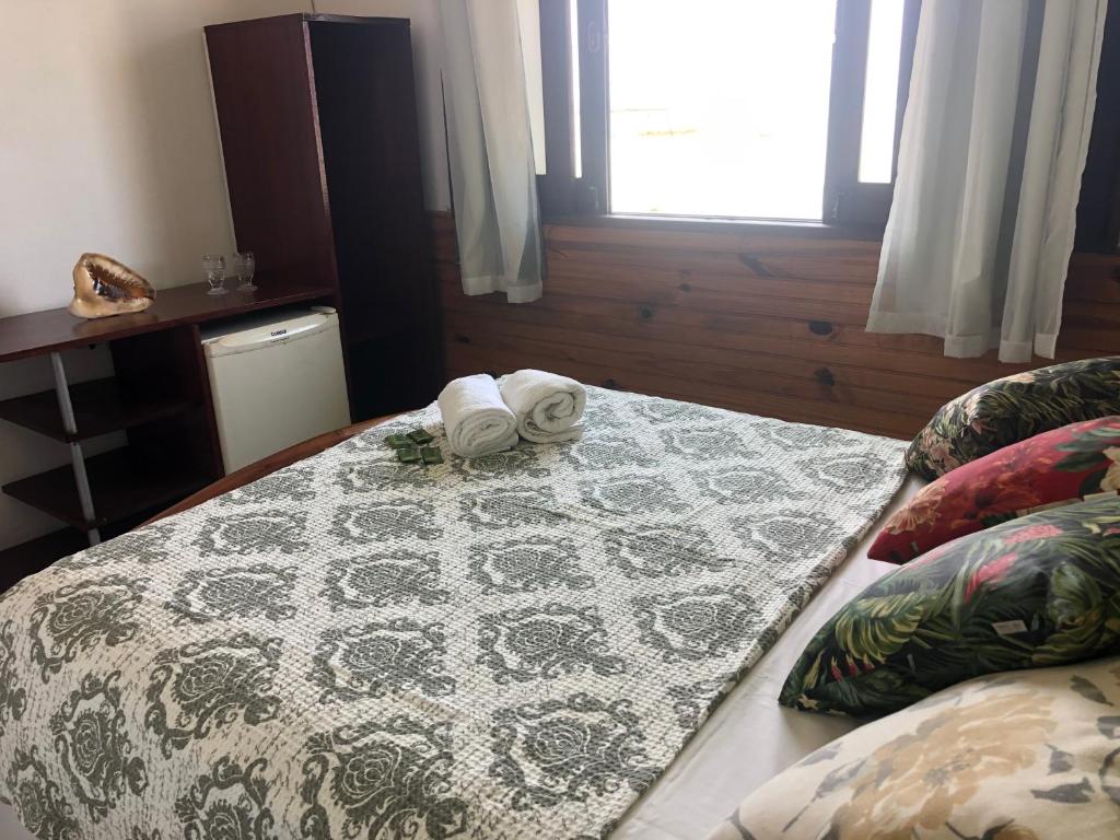 Postel nebo postele na pokoji v ubytování Pousada Tranquila