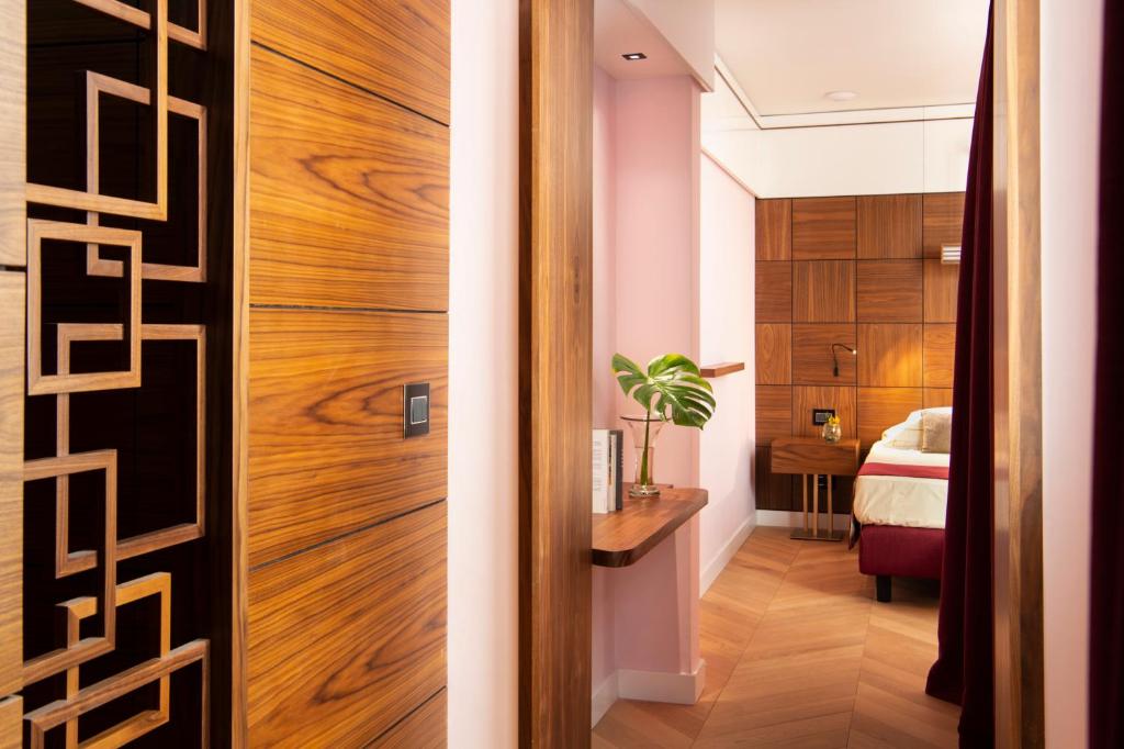 Postel nebo postele na pokoji v ubytování Hotel degli Orafi