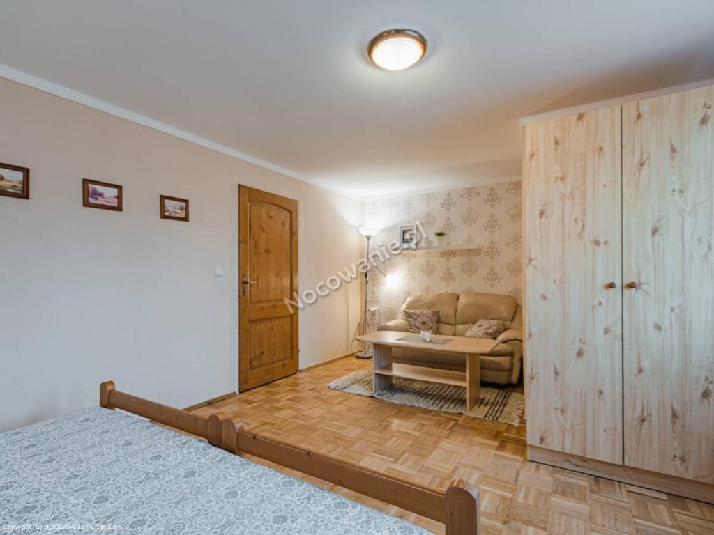 Postel nebo postele na pokoji v ubytování Penzion u Laca