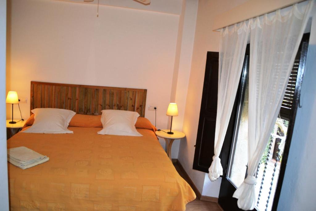Postel nebo postele na pokoji v ubytování Habitaciones con encanto - Cal Alejandro