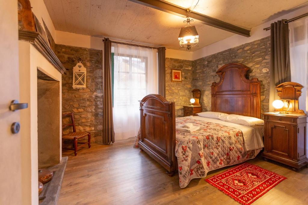 A bed or beds in a room at Vecchia Perledo 1907