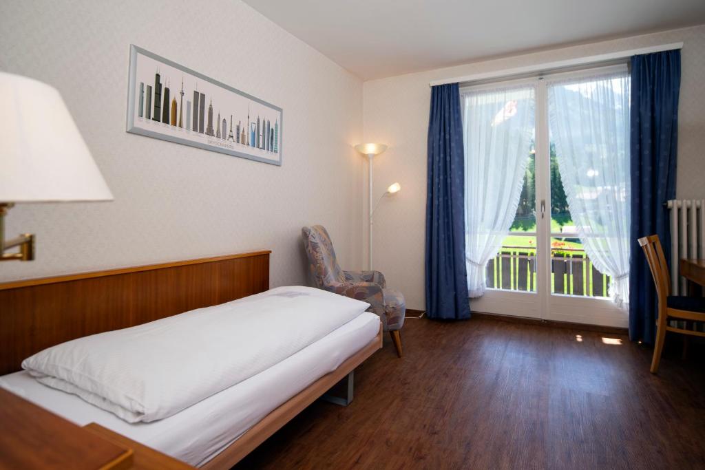 Postel nebo postele na pokoji v ubytování Hotel Berghaus