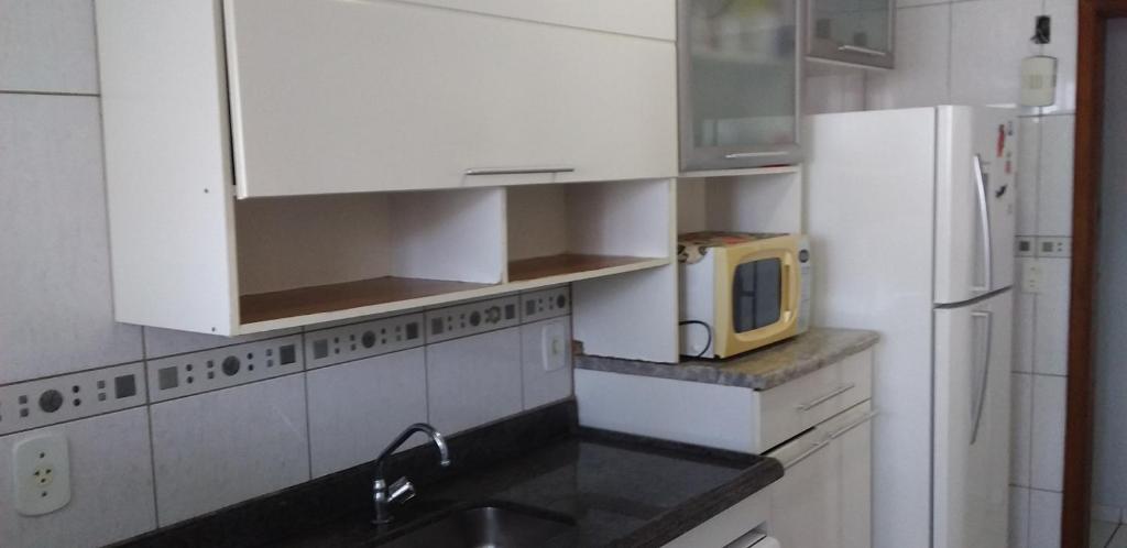  APARTAMENTO Vl GUILHERMINA 90 METROS DA PRAIA - AR CONDICIONADO !! !!!