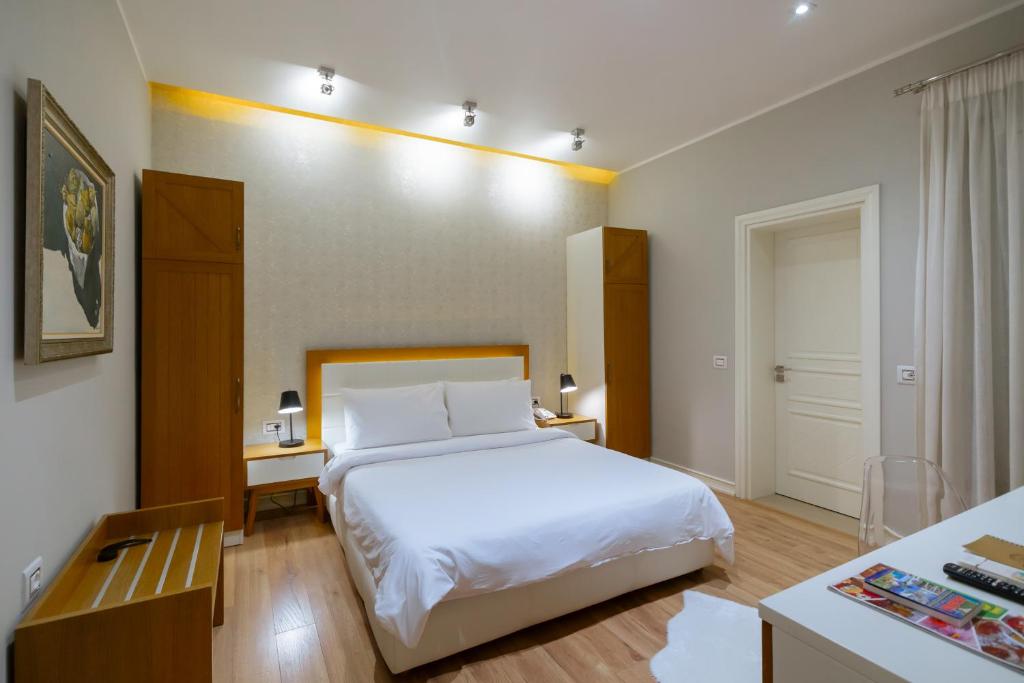 Postel nebo postele na pokoji v ubytování Villa Ester