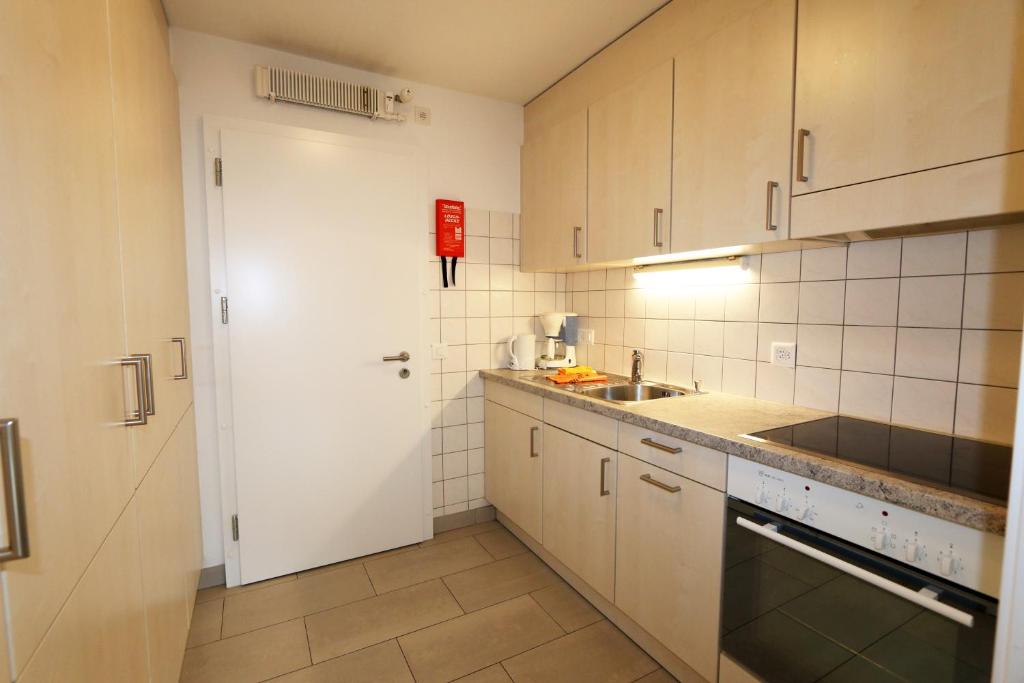 Kuchyň nebo kuchyňský kout v ubytování Haus Cristal