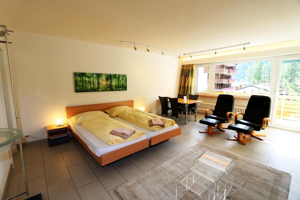 Postel nebo postele na pokoji v ubytování Haus Cristal