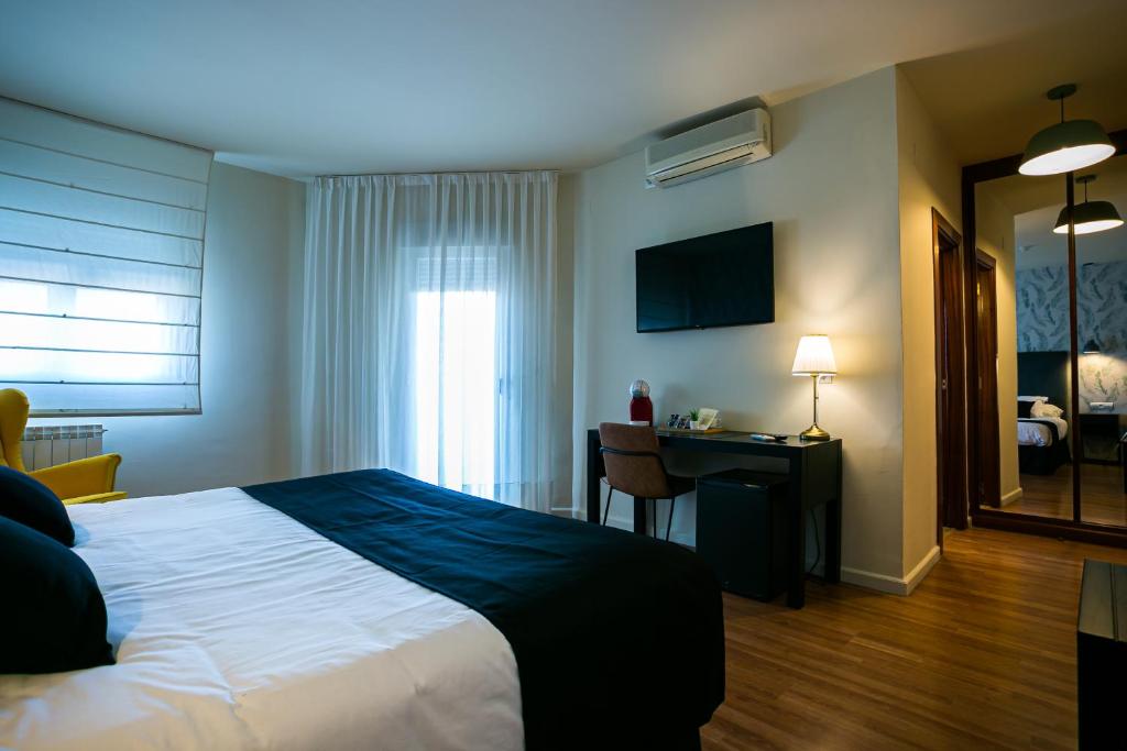Posteľ alebo postele v izbe v ubytovaní Hotel Spa Sinagoga