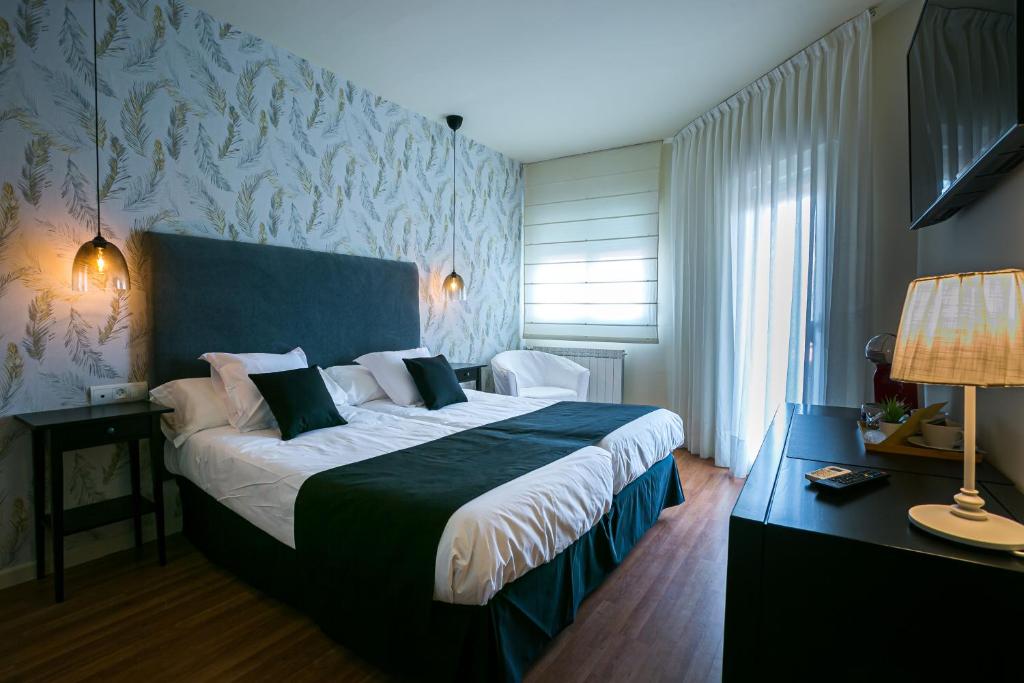 Posteľ alebo postele v izbe v ubytovaní Hotel Spa Sinagoga
