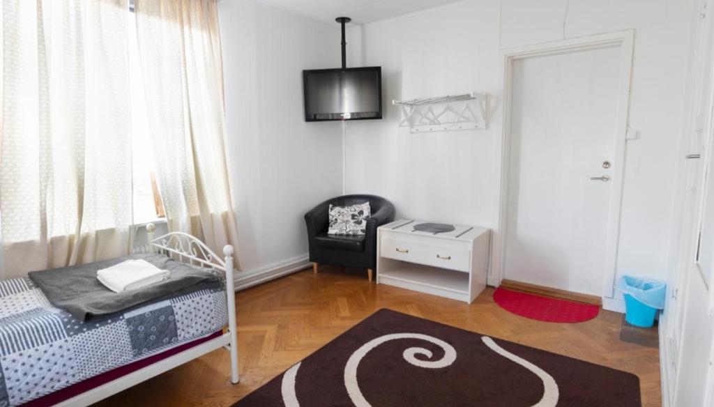 Postel nebo postele na pokoji v ubytování Motala Wärdshus