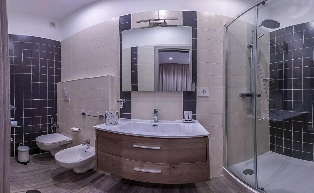 Koupelna v ubytování Le Origini Rooms&Suite