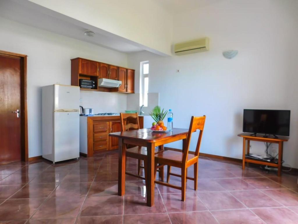 Kuchyň nebo kuchyňský kout v ubytování Tulsi Apartment & Studio