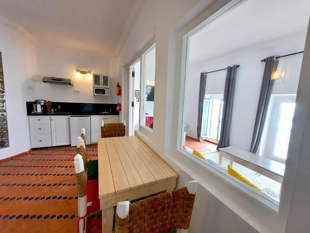 Kuchyň nebo kuchyňský kout v ubytování Jack's Apartments & Suites