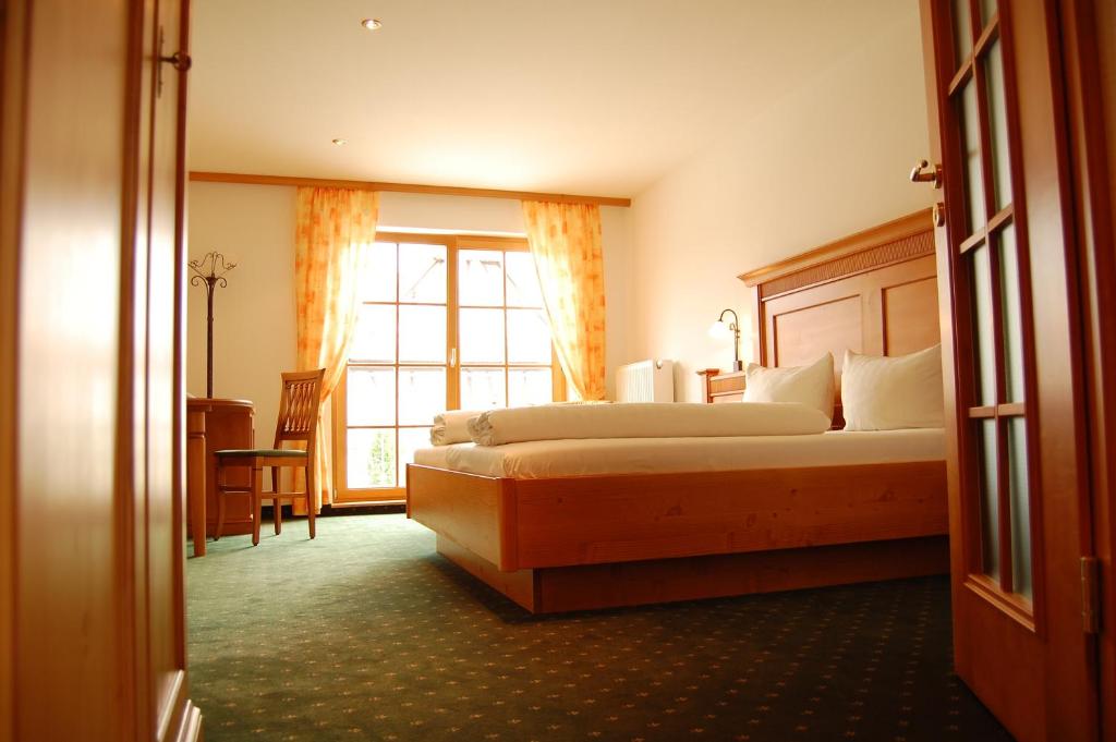 Postel nebo postele na pokoji v ubytování Hotel Ochsen