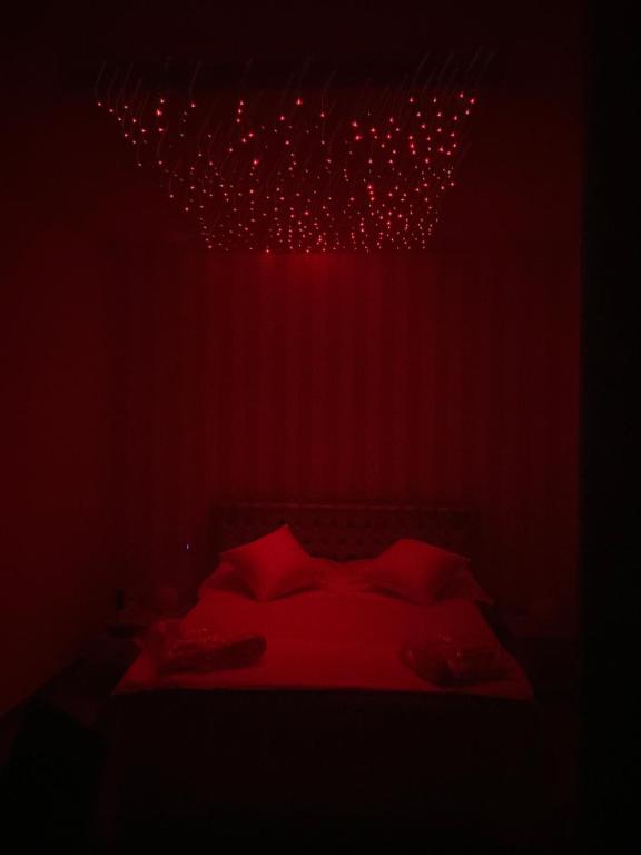 Postel nebo postele na pokoji v ubytování Le Origini Rooms&Suite