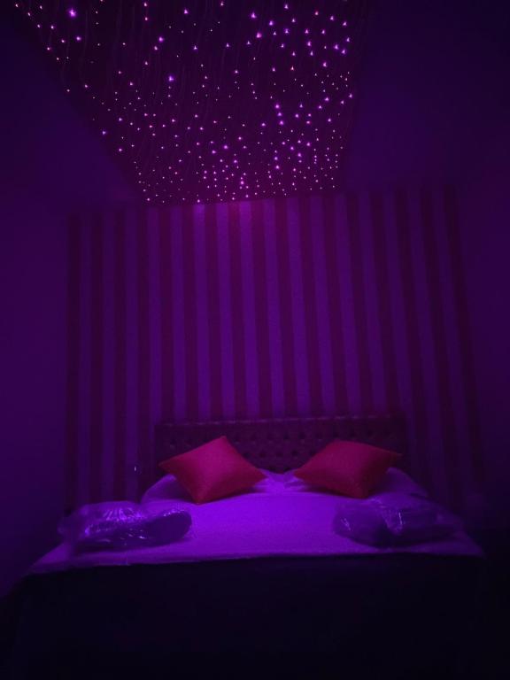 Postel nebo postele na pokoji v ubytování Le Origini Rooms&Suite