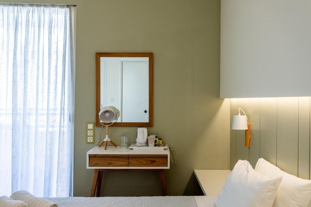Posteľ alebo postele v izbe v ubytovaní Lefktron Hotel
