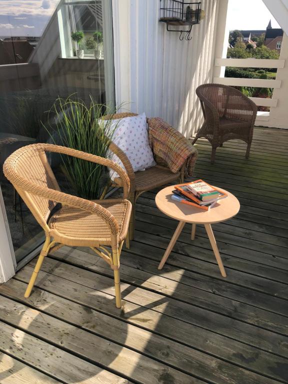 Balkón nebo terasa v ubytování Dejligt værelse med eget bad og havudsigt