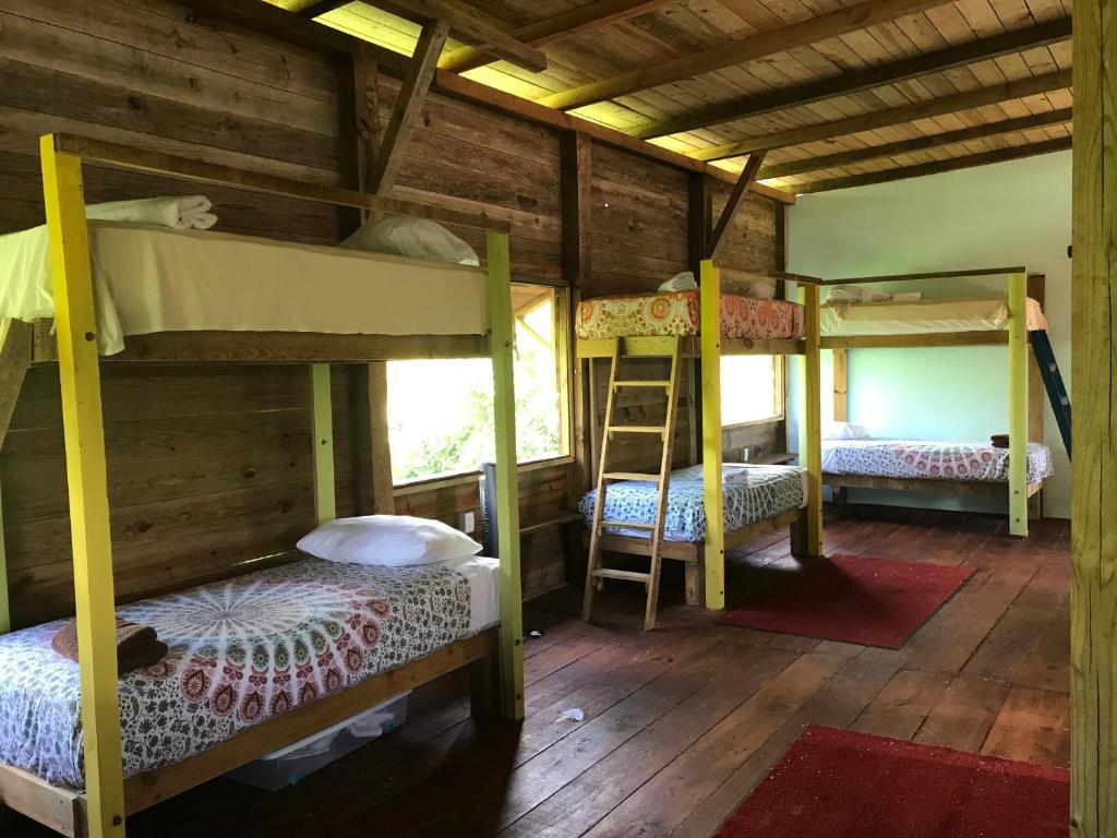 Postel nebo postele na pokoji v ubytování Aventura Rincon Ecolodge