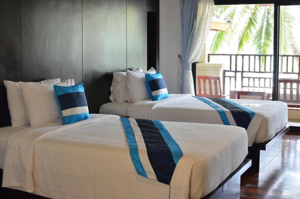 Postel nebo postele na pokoji v ubytování Klong Prao Resort