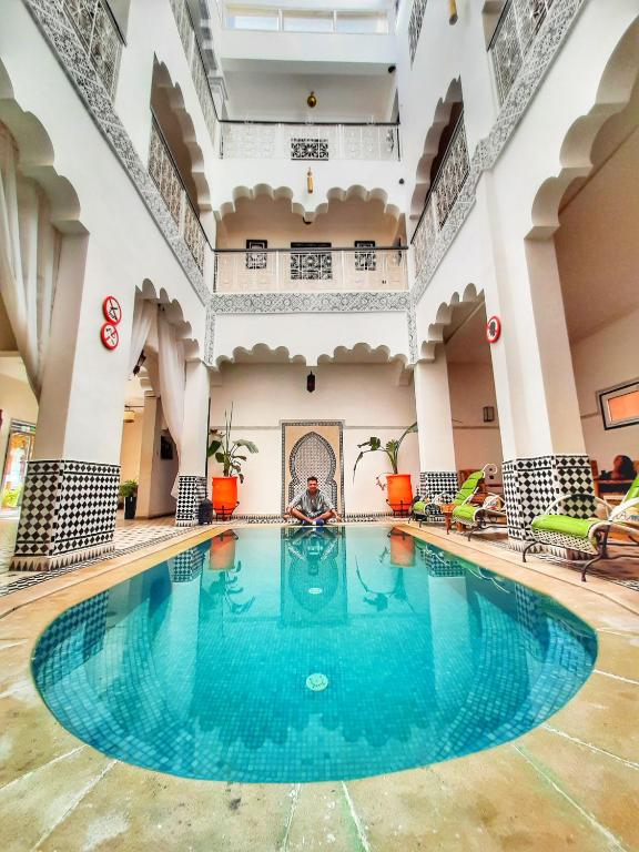 Bazén v ubytování Hotel Riad Amlal nebo v jeho okolí