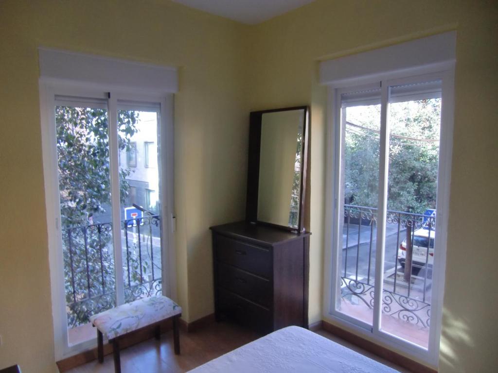 Postel nebo postele na pokoji v ubytování M17 Madrid Centro apartamento con wifi