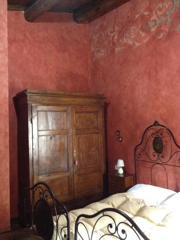 Postel nebo postele na pokoji v ubytování IL BORGO DI SAN PIO
