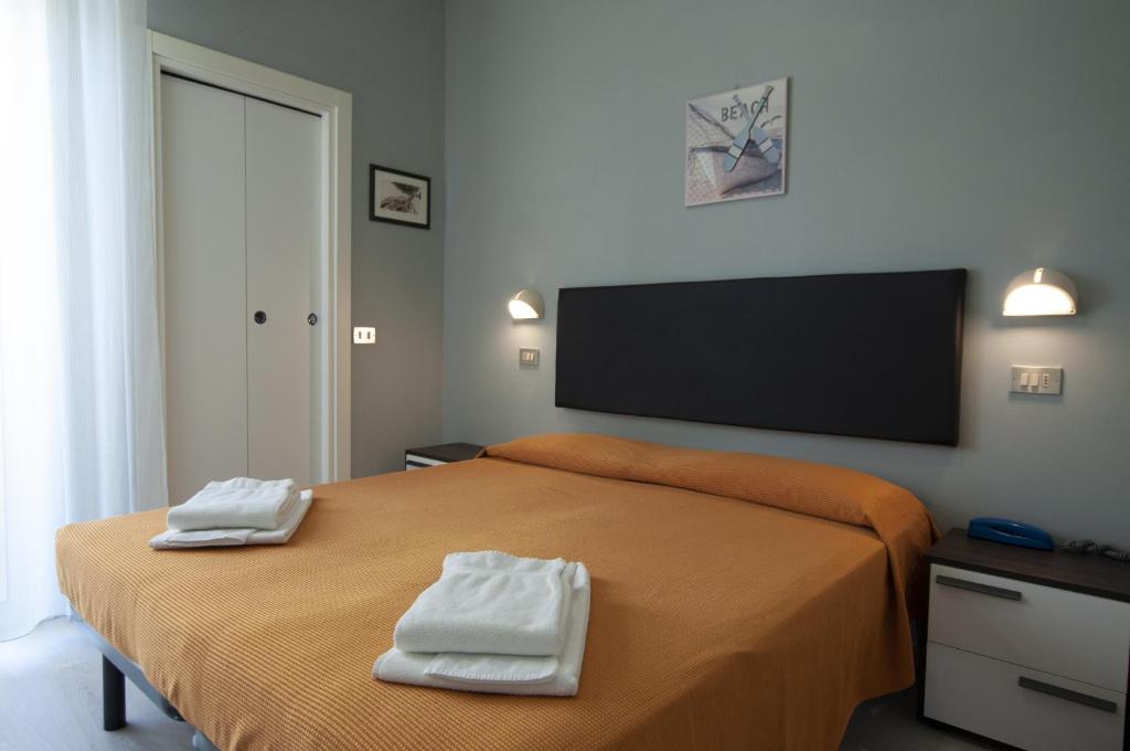 Cama o camas de una habitación en Hotel Milena