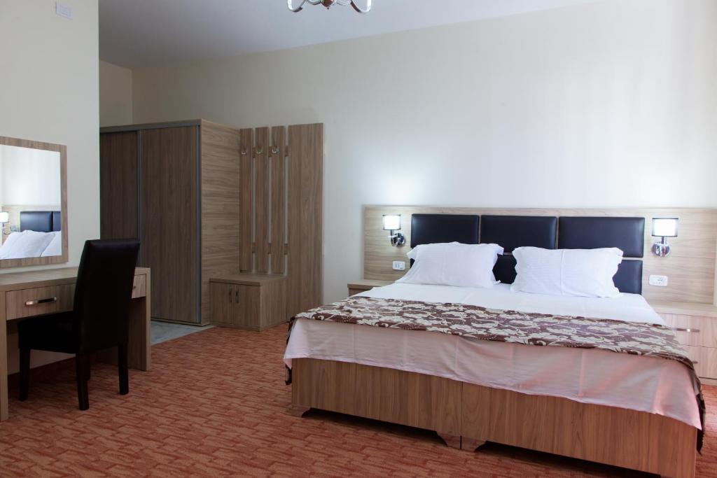 Postel nebo postele na pokoji v ubytování Spa Hotel Montefila