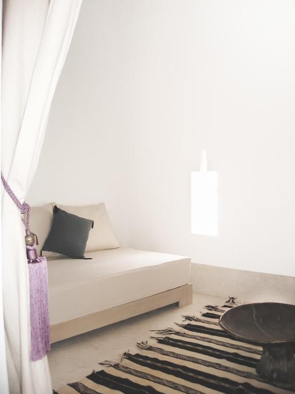 Postel nebo postele na pokoji v ubytování Riad Dar-K