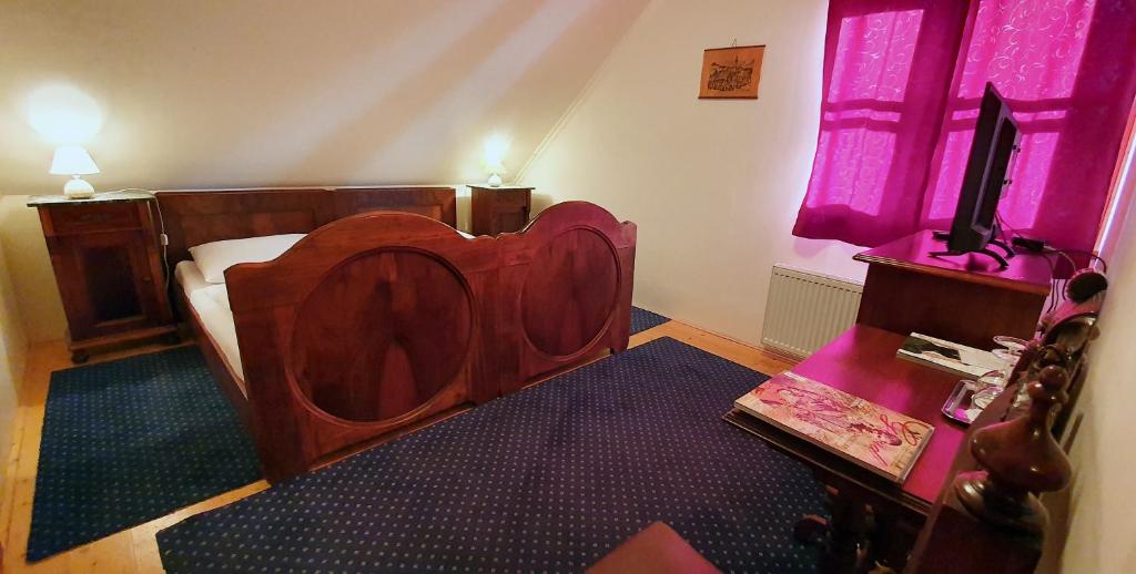 Postel nebo postele na pokoji v ubytování Koliba Valaška