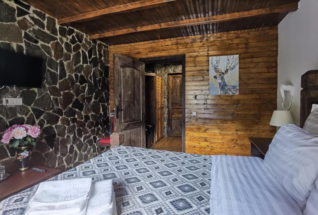 Postel nebo postele na pokoji v ubytování Cabana Zimbru Transfagarasan