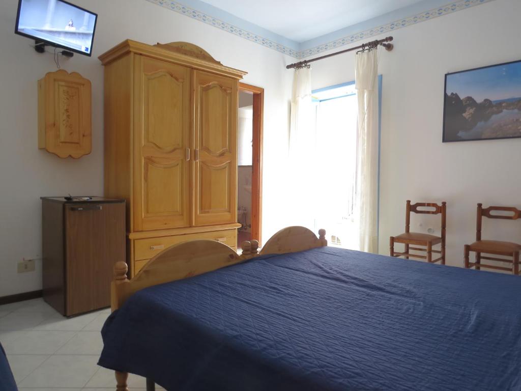 Postel nebo postele na pokoji v ubytování Casa Vittorio B&b