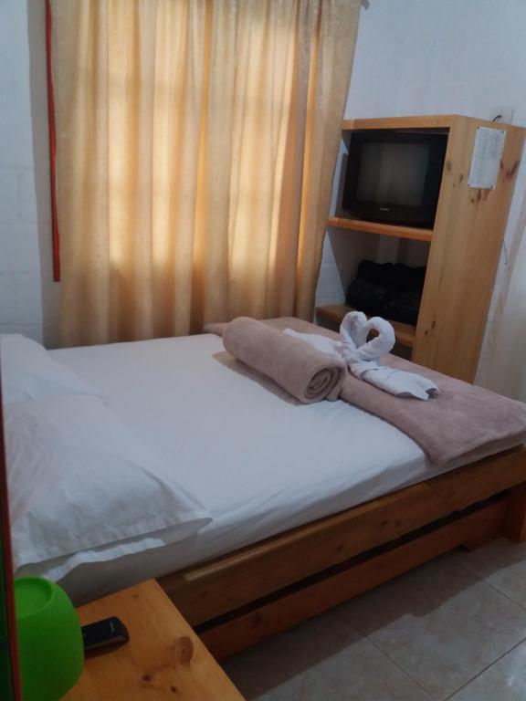 Postel nebo postele na pokoji v ubytování Nirvana House Calima Darien