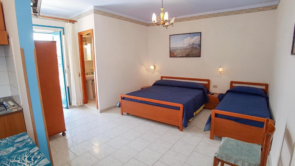 Postel nebo postele na pokoji v ubytování Casa Vittorio B&b
