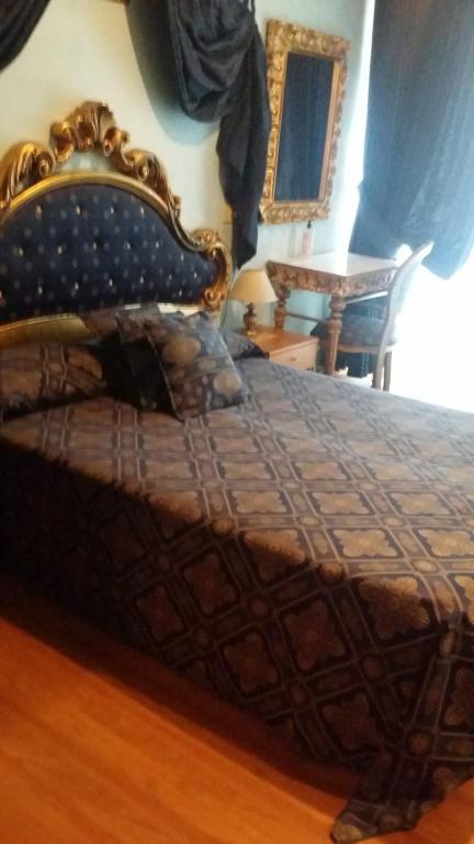 Postel nebo postele na pokoji v ubytování Hotel Abaco