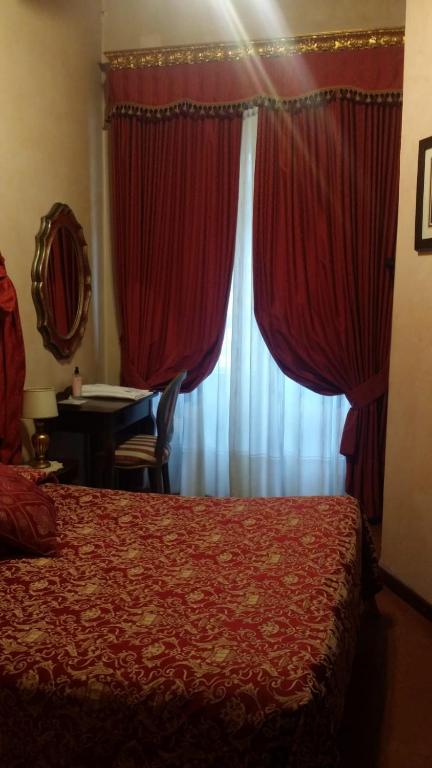 Postel nebo postele na pokoji v ubytování Hotel Abaco