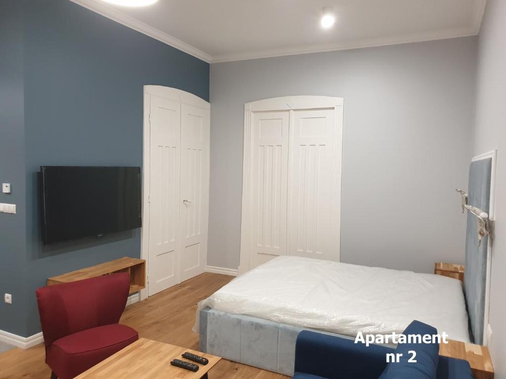 Posteľ alebo postele v izbe v ubytovaní Apartamenty Centrum - Mickiewicza