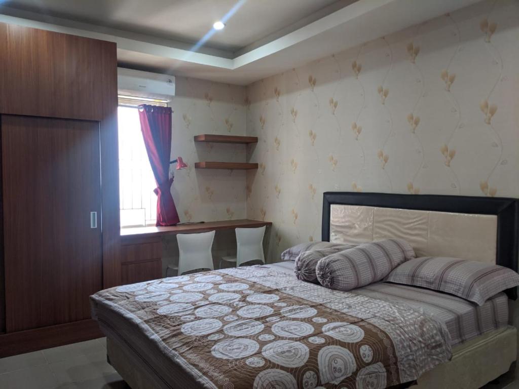 Кровать или кровати в номере Pinewood Apartment by Vial