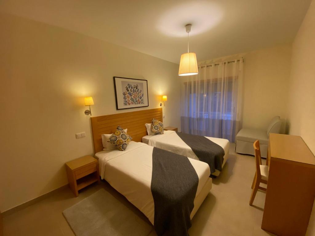 Postel nebo postele na pokoji v ubytování Villas Mare Residence