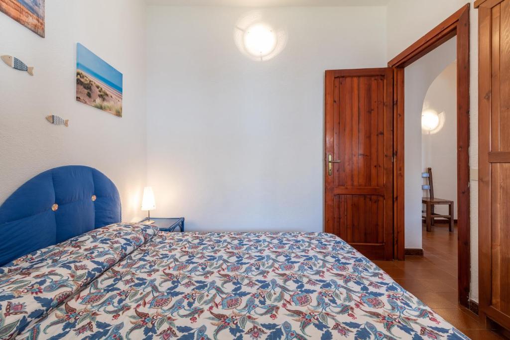 Łóżko lub łóżka w pokoju w obiekcie Villa Mercede