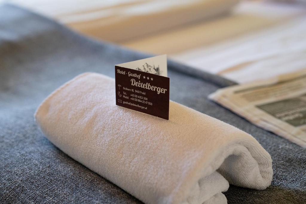 Postel nebo postele na pokoji v ubytování Hotel-Gasthof Deixelberger