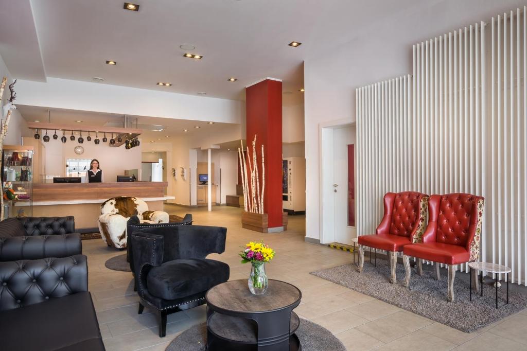Posezení v ubytování Sure Hotel by Best Western Muenchen Hauptbahnhof