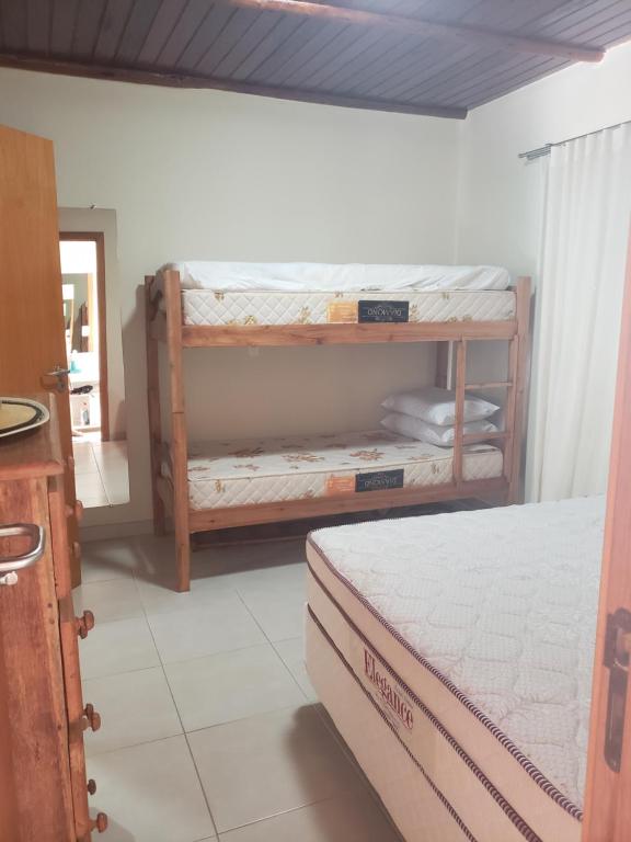 Postel nebo postele na pokoji v ubytování ITACIMIRIM SUMMER HOUSEs