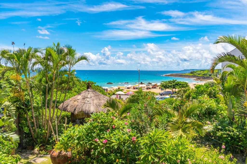 a view of the beach from the resort at Red Garden Resort in Eluan