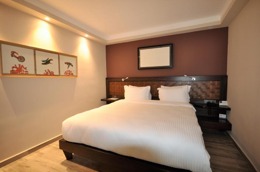 Postel nebo postele na pokoji v ubytování Resa Hotel Göcek
