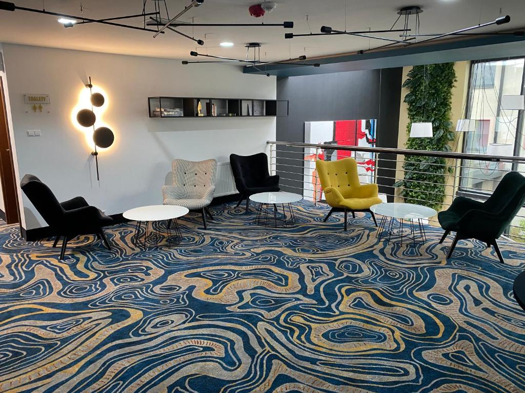 Posedenie v ubytovaní Arena Hotel Spa & Wellness